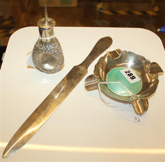 Silver Hong Kong marked perfume bottle, a paper knife and a blue enamelled silver ashtray